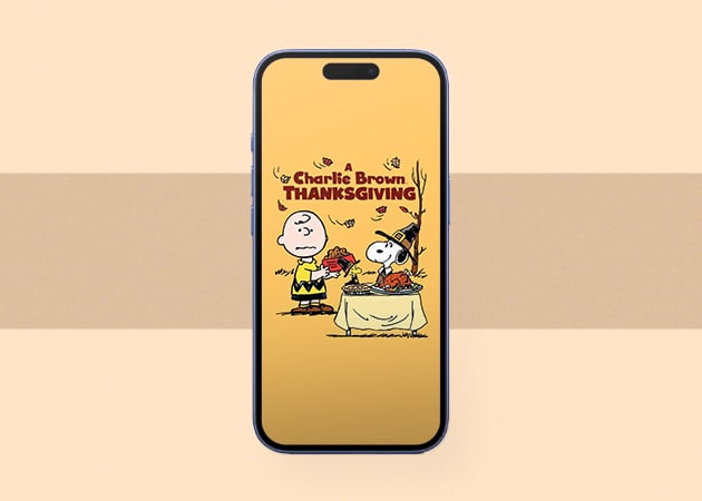 Snoopy and Charlie Brown Thanksgiving iPhone wallpaper.